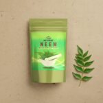 ACTIZEET neem powder on recycled paper with neem sprig