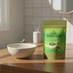 ACTIZEET Haritaki Powder on bathroom vanity for daily wellness ritual