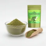 ACTIZEET Tulsi powder product pouch next to a bowl of herbal powder on white