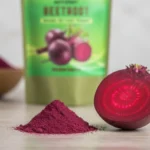 Close-up of fine ACTIZEET powder texture next to a sliced beetroot cross-section